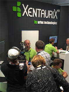  Smith and the XENTAURIX team at the fair.